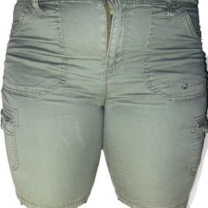 Green cargo shorts with black top